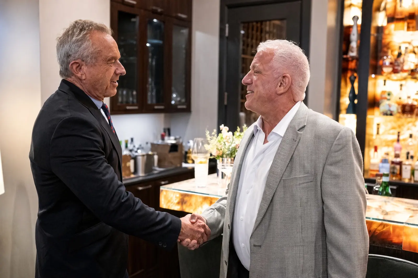 Robert F. Kennedy Jr. and Dr. Gary Kompothecras shake hands
